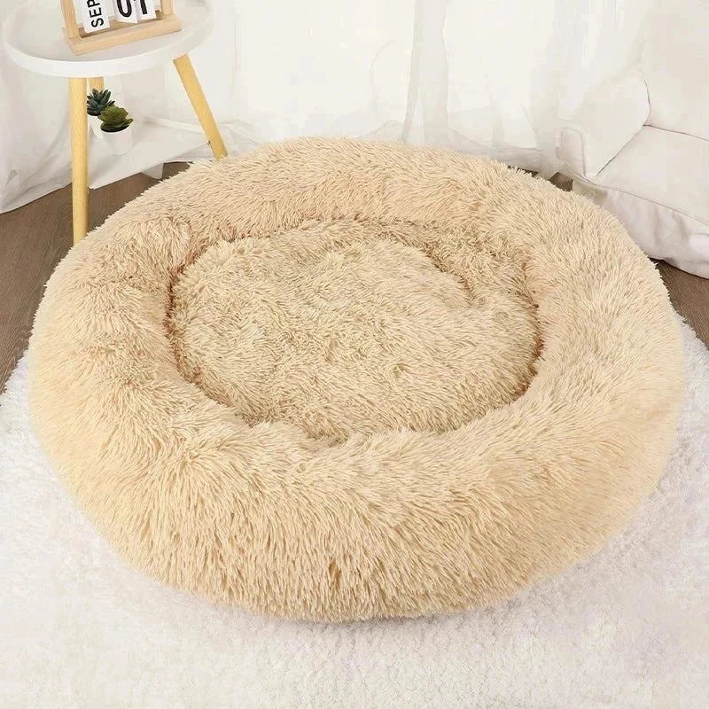 Plush calming pet bed for ultimate relaxation and support, featuring a non-slip base.