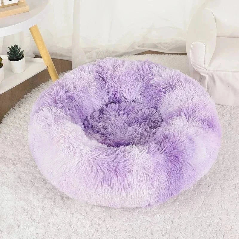 Plush purple pet bed providing ultimate relaxation and support, featuring a non-slip base and washable design.